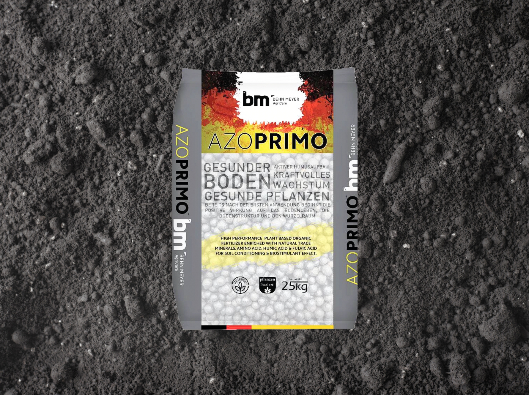 AZOPRIMO from Behn Meyer AgriCare on black soil or gravel background.
